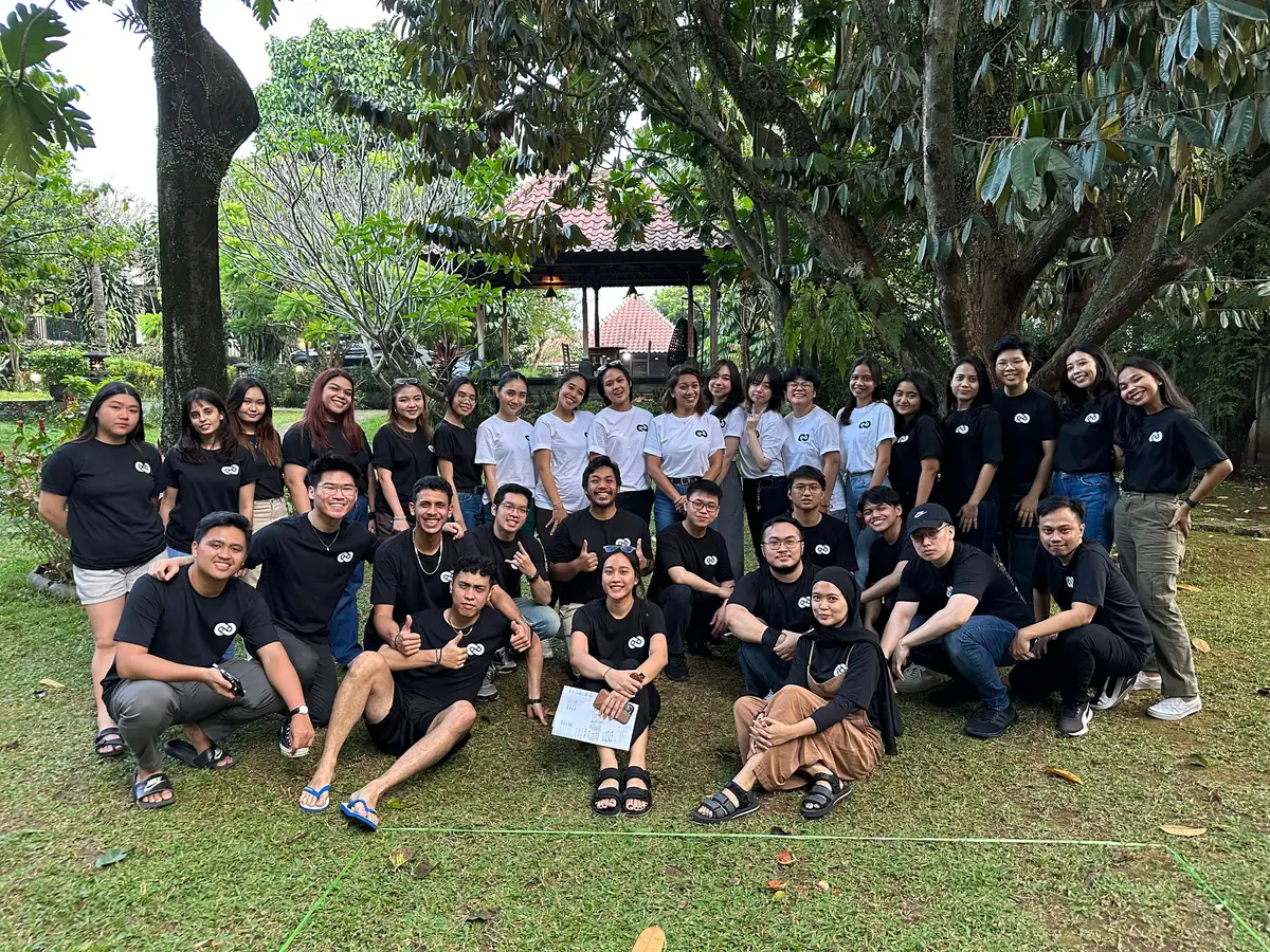 The Eterna team gathered in a garden in Jakarta